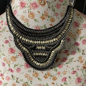 Black and gold beaded and sequined bib necklace